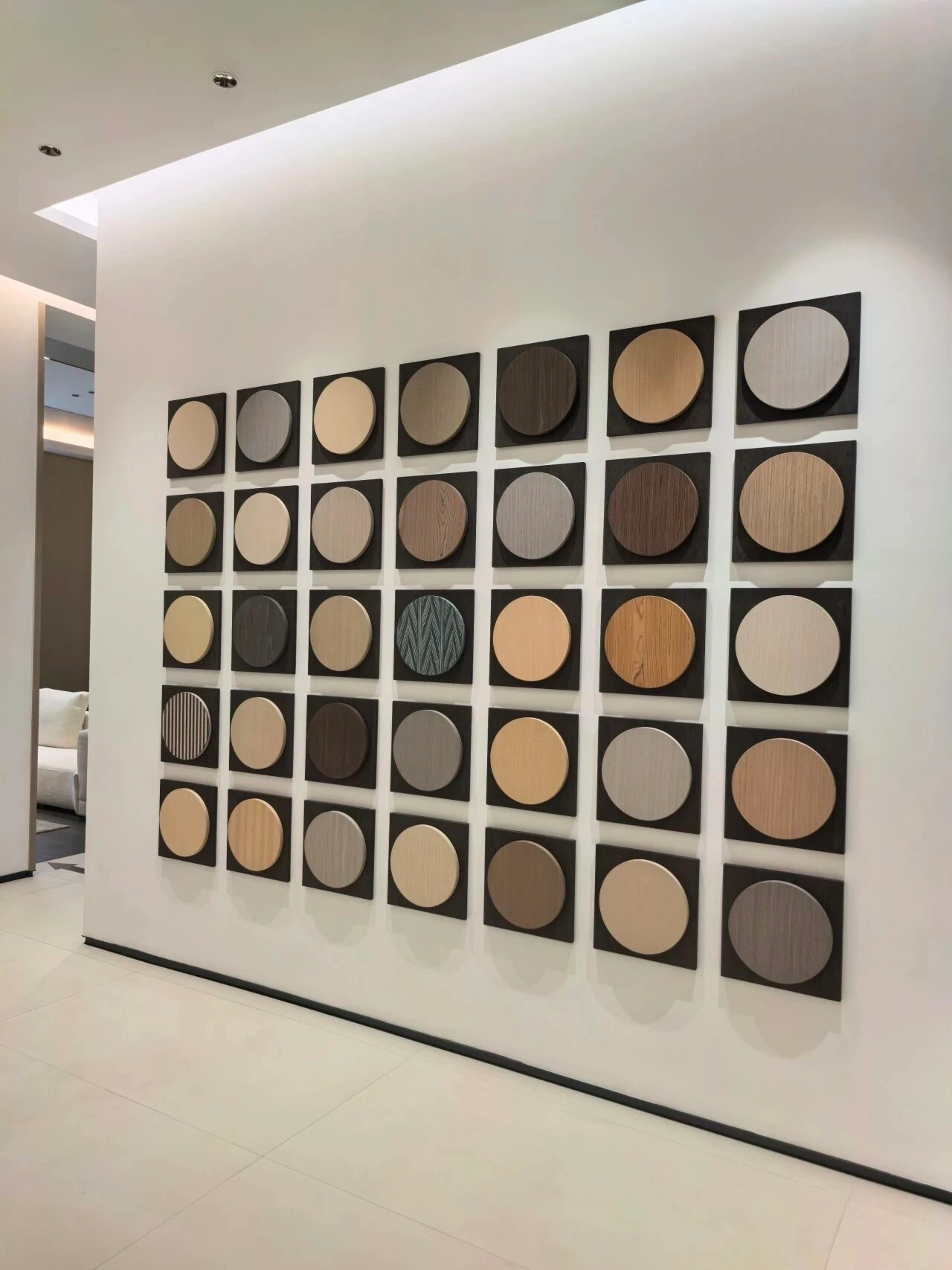 Display of wood veneer finish samples in different colors and grain patterns