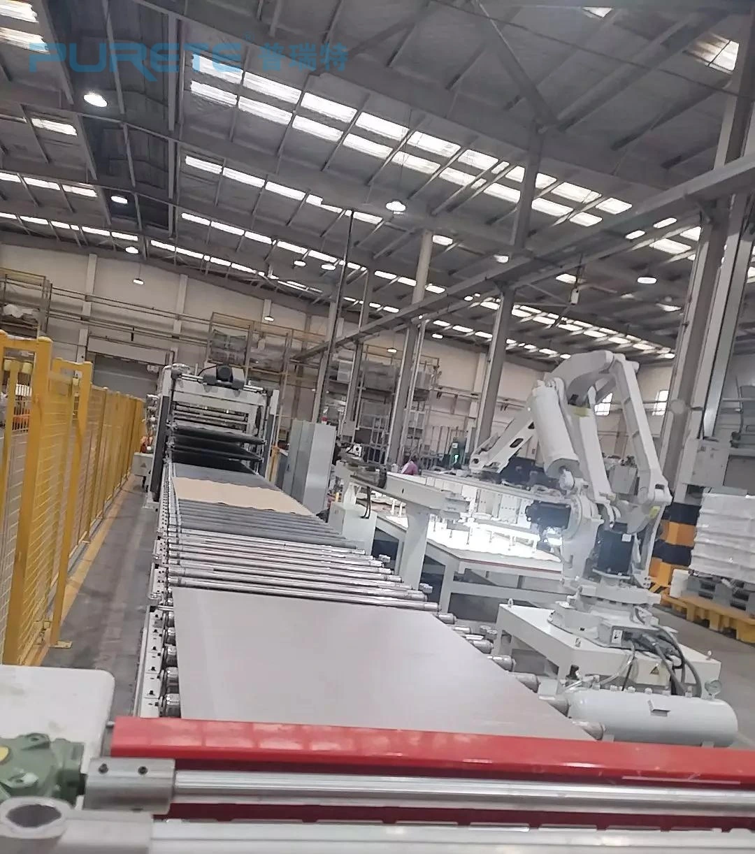 PURETE production line for veneer and acoustic panel pressing PURETE production line for veneer and acoustic panel pressing