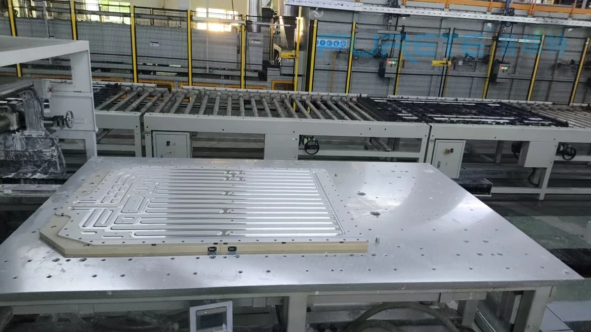 Liquid-cooling plate on a transfer line before brazing. Liquid-cooling plate on a transfer line before brazing.